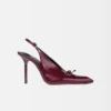 De höga Cubisto-slingback-skorna Slingback-pumps De höga Cubisto-slingback-skorna Slingback-pumps