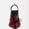 De höga Cubisto-slingback-skorna Slingback-pumps De höga Cubisto-slingback-skorna Slingback-pumps