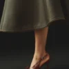 De höga Cubisto-slingback-skorna Slingback-pumps De höga Cubisto-slingback-skorna Slingback-pumps