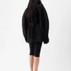Den korta trenchcoaten Ovalo Trenchcoat med timglasform Den korta trenchcoaten Ovalo Trenchcoat med timglasform