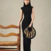 Den lilla runda väskan Spiaggia Liten cirkelformad väska i raffia