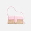 Den långa flätade Bambino Wicker-väskan med lock Den långa flätade Bambino Wicker-väskan med lock