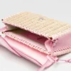 Den långa flätade Bambino Wicker-väskan med lock Den långa flätade Bambino Wicker-väskan med lock