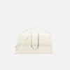 Den stora Bambino Cross-body-väskan med metallklaff Den stora Bambino Cross-body-väskan med metallklaff