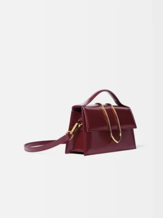 Den stora Bambino Cross-body-väskan med metallklaff