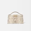 Den stora Bambino Cross-body-väskan med metallklaff Den stora Bambino Cross-body-väskan med metallklaff