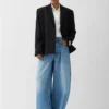 Jeans från Ovalo de-Nîmes Jeans med hög midja och kurvig passform Jeans från Ovalo de-Nîmes Jeans med hög midja och kurvig passform