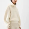 Pallone-stickad tröja med bred turtleneck
