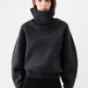 Pallone-stickad tröja med bred turtleneck