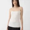Plumetis-stickad draperad linne