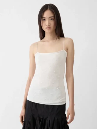 Plumetis-stickad draperad linne
