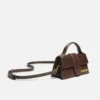The Bambino Liten väska med lock